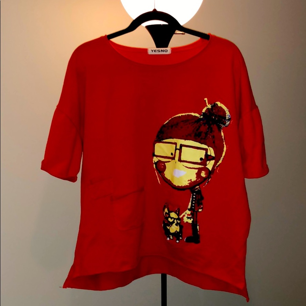 Red loose cotton shirt.  Cool print on front